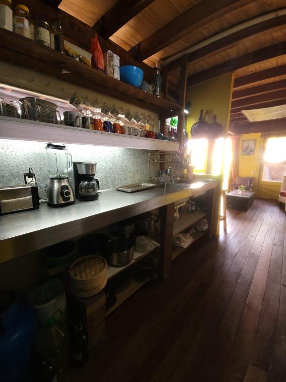 Kuchyň nebo kuchyňský kout v ubytování Casa Encantada Guest House