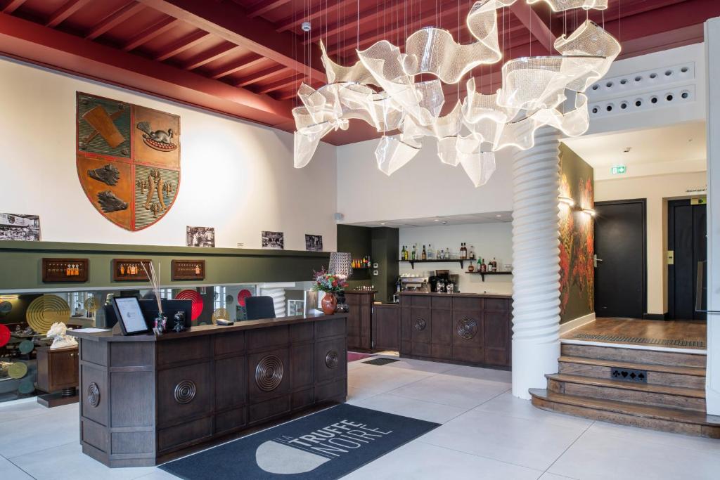 Vstupní hala nebo recepce v ubytování Hôtel La Truffe Noire