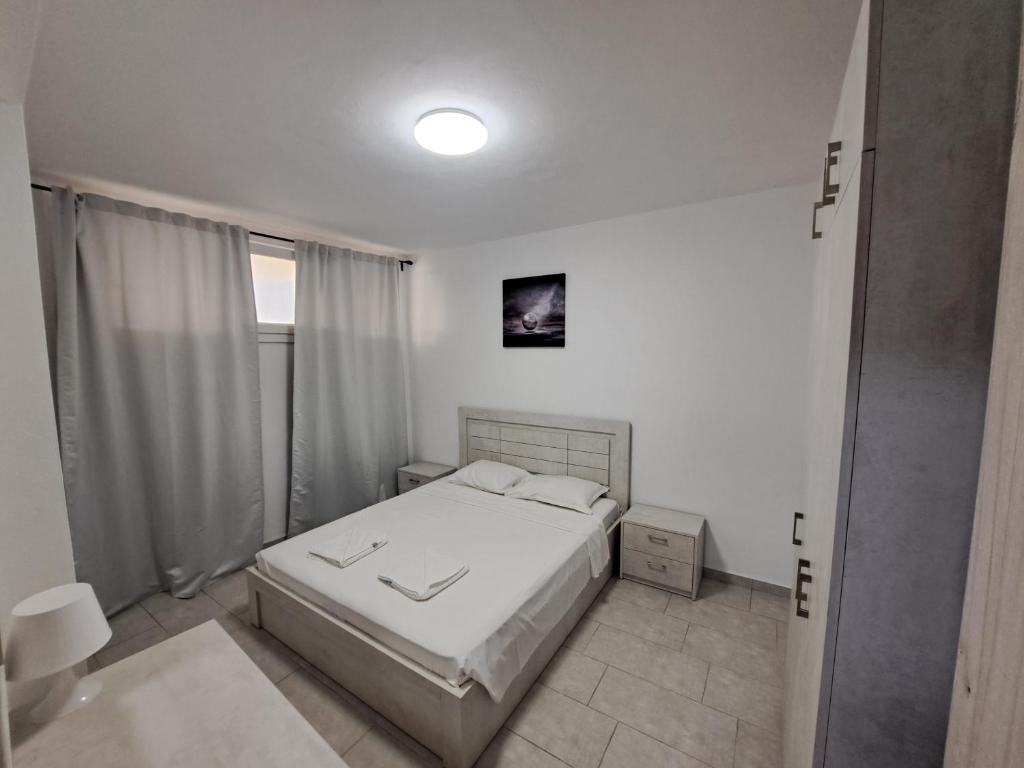A bed or beds in a room at SYKA Thassos - Villa 4 Rooms SKALA RACHONIOU