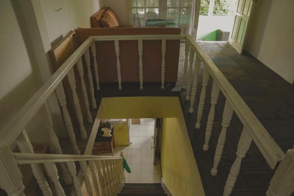 Postel nebo postele na pokoji v ubytování Banua KDP - Coffee & Breakfast