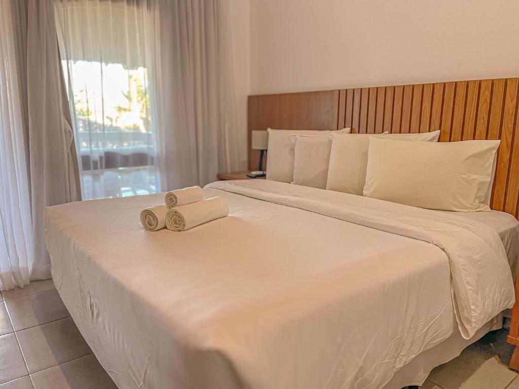 Postel nebo postele na pokoji v ubytování Mar Paraíso Hotel