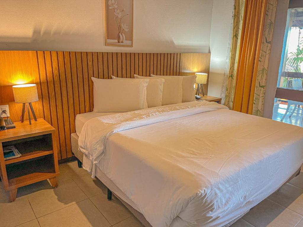Postel nebo postele na pokoji v ubytování Mar Paraíso Hotel