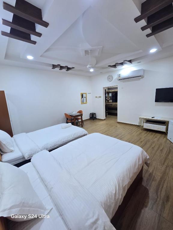 Postel nebo postele na pokoji v ubytování Dar Al Salaam Hospitality House