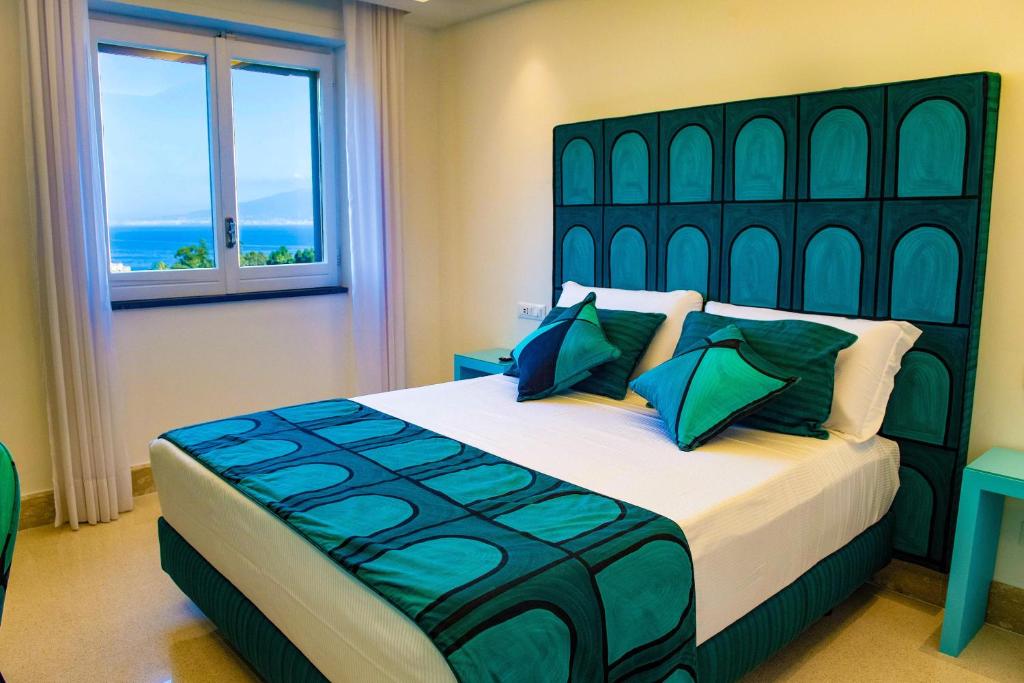 Postel nebo postele na pokoji v ubytování B&B Caporivo