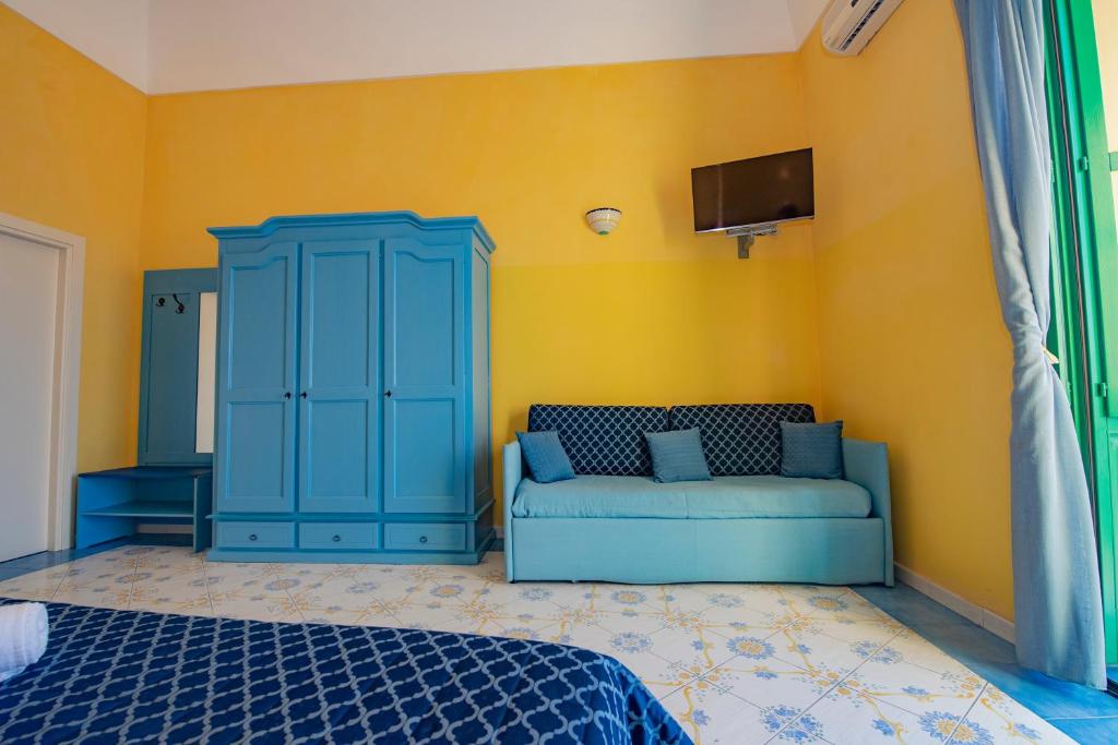 TV a/nebo společenská místnost v ubytování Hotel Savoia