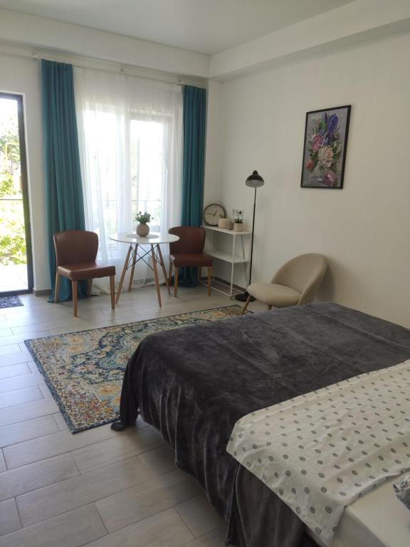 Postel nebo postele na pokoji v ubytování Family Нotel Banuri