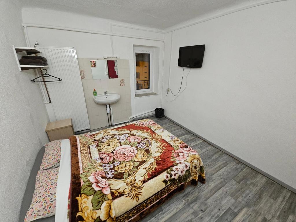 Postel nebo postele na pokoji v ubytování Hotel de la Gare