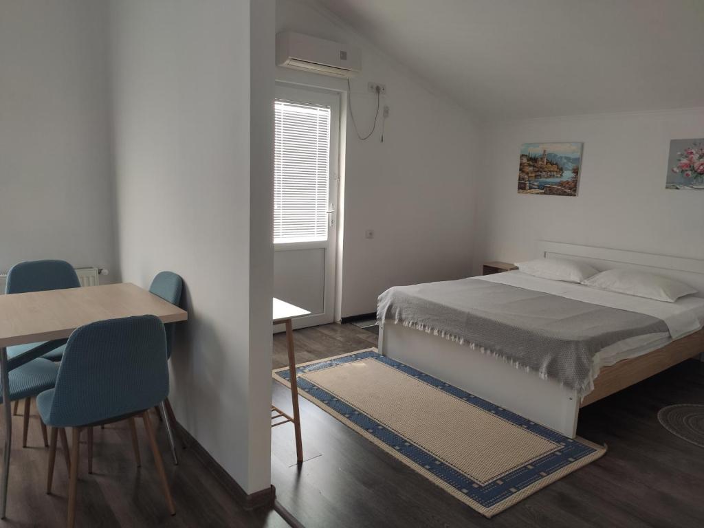 Postel nebo postele na pokoji v ubytování Family Нotel Banuri