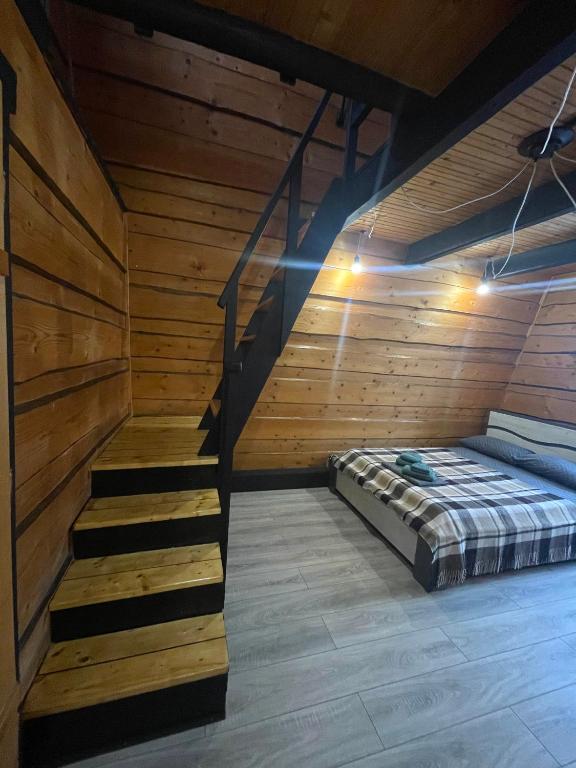 Postel nebo postele na pokoji v ubytování Khatky Na Penkakh