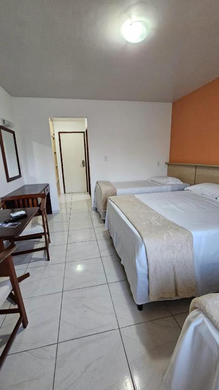 Postel nebo postele na pokoji v ubytování JL Temporadas - Quarto Portobello Park Hotel
