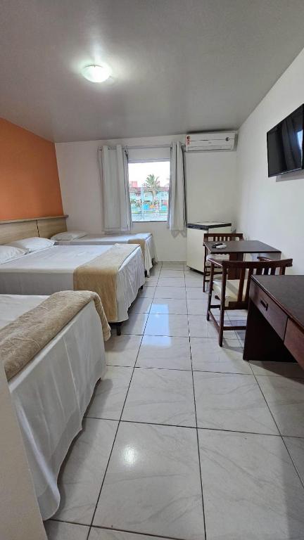 Postel nebo postele na pokoji v ubytování JL Temporadas - Quarto Portobello Park Hotel