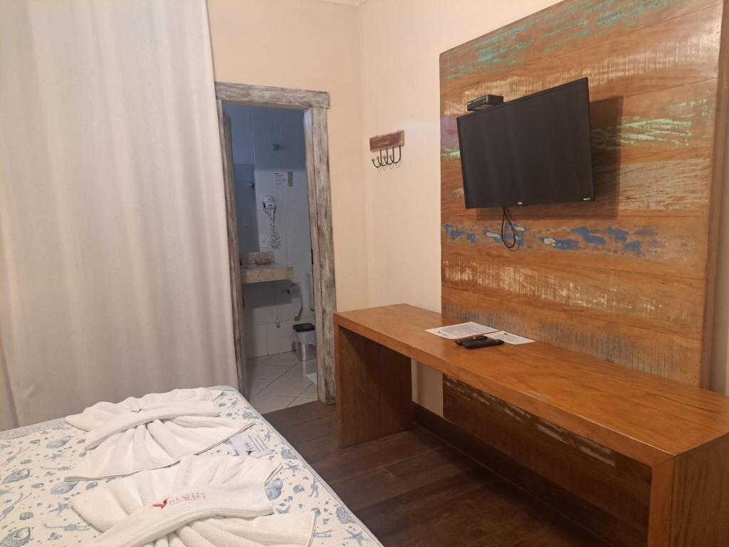 TV a/nebo společenská místnost v ubytování Pousada Encanto da Serra