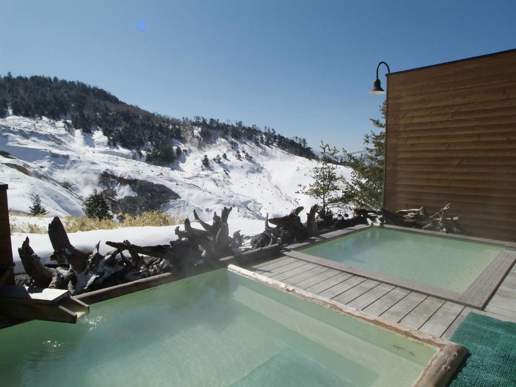 Bazén v ubytování Manza Juraku All-inclusive Hotel nebo v jeho okolí
