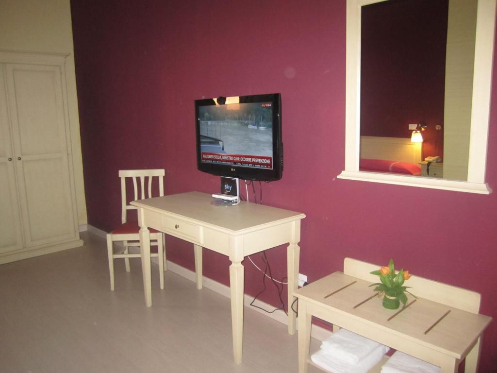 TV a/nebo společenská místnost v ubytování Hotel Genzianella