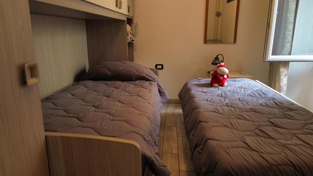 Postel nebo postele na pokoji v ubytování L'antica torre