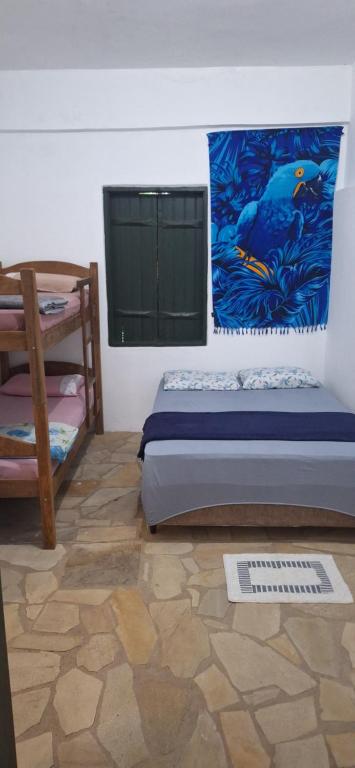 Postel nebo postele na pokoji v ubytování Paradise Hospedaria São Thomé