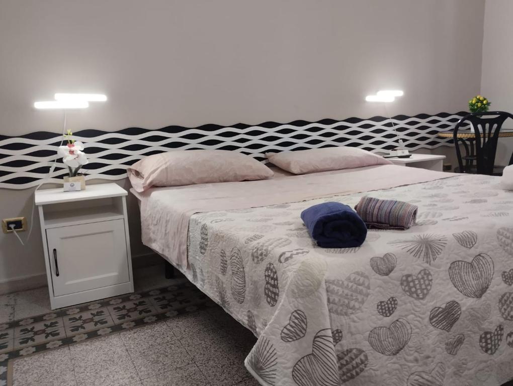 Postel nebo postele na pokoji v ubytování Al Duomo