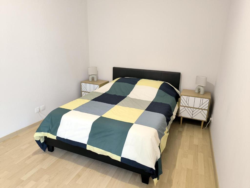 Postel nebo postele na pokoji v ubytování Appartement entier 56 m2 aux portes de Genève