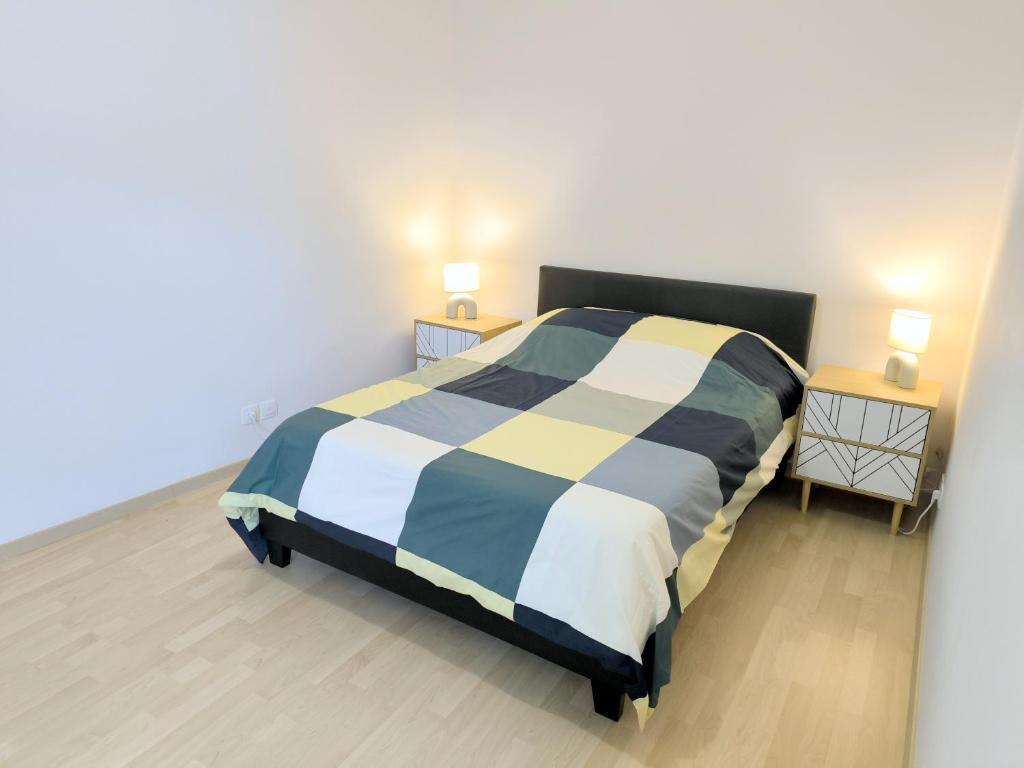 Postel nebo postele na pokoji v ubytování Appartement entier 56 m2 aux portes de Genève