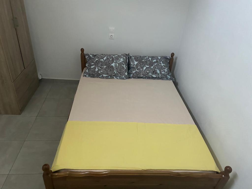 Postel nebo postele na pokoji v ubytování Lemonia