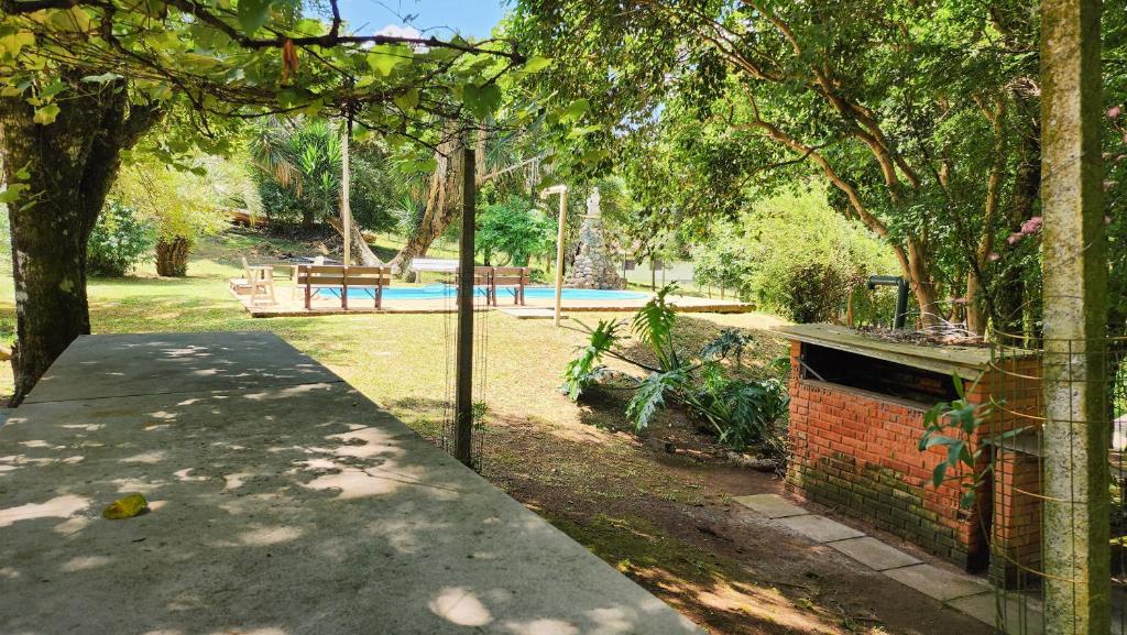 excluido في غاريبالدي: حديقه خلفيه بها مسبح وسياج