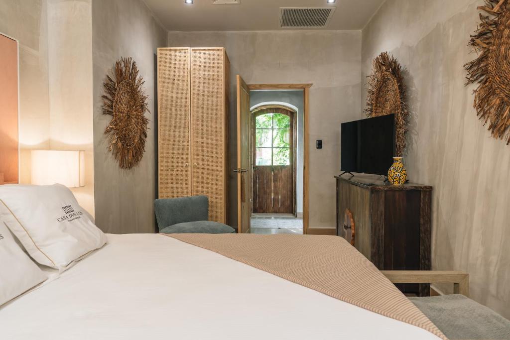 Postel nebo postele na pokoji v ubytování Hotel Casa Don Luis Cap Cana by Faranda Boutique