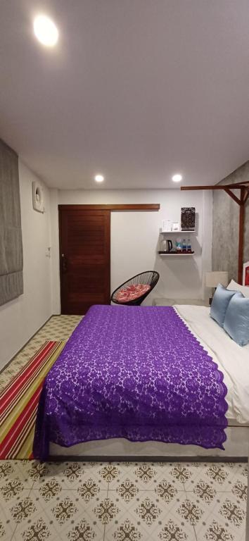 Postel nebo postele na pokoji v ubytování Mukrada House Boutique Hometel Krabi
