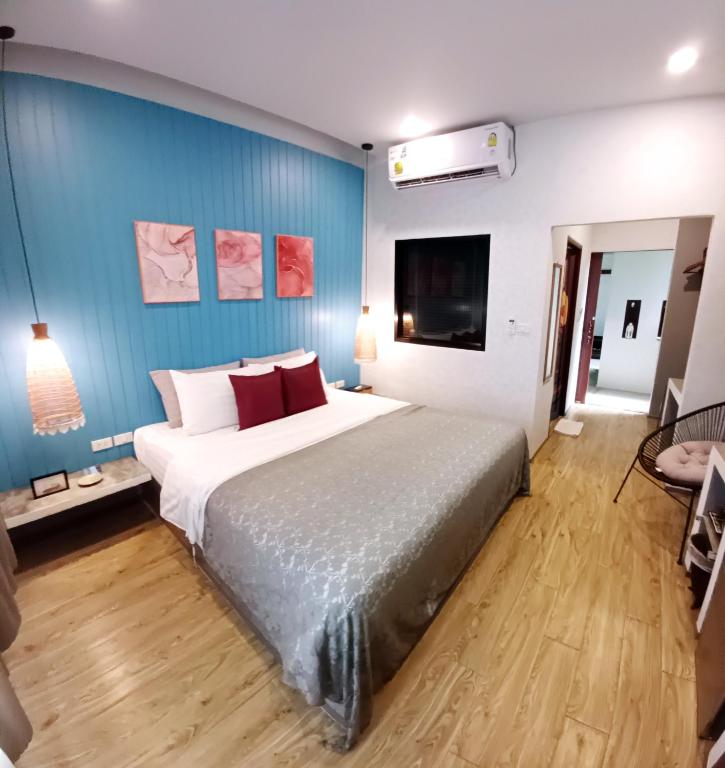 Postel nebo postele na pokoji v ubytování Mukrada House Boutique Hometel Krabi