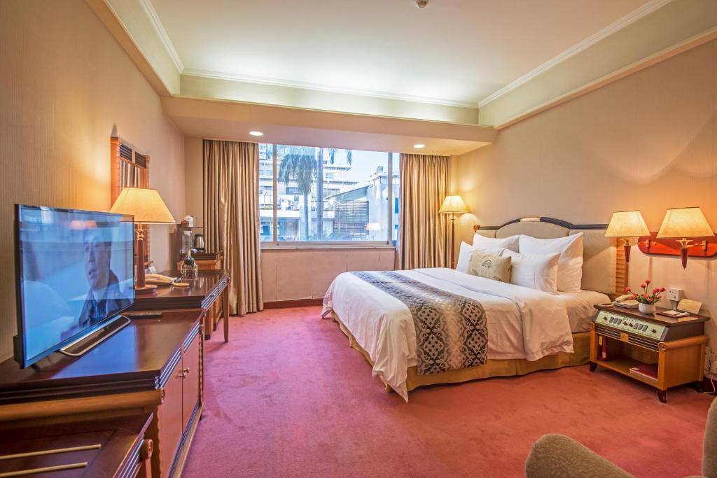 TV a/nebo společenská místnost v ubytování Panyu Hotel