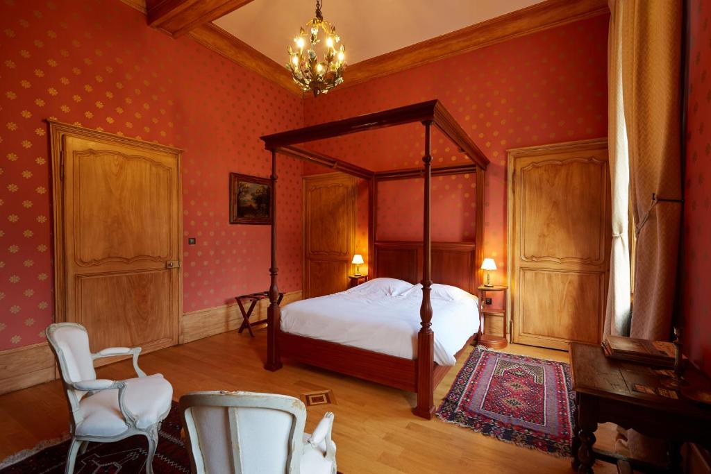 Postel nebo postele na pokoji v ubytování Château D'arry