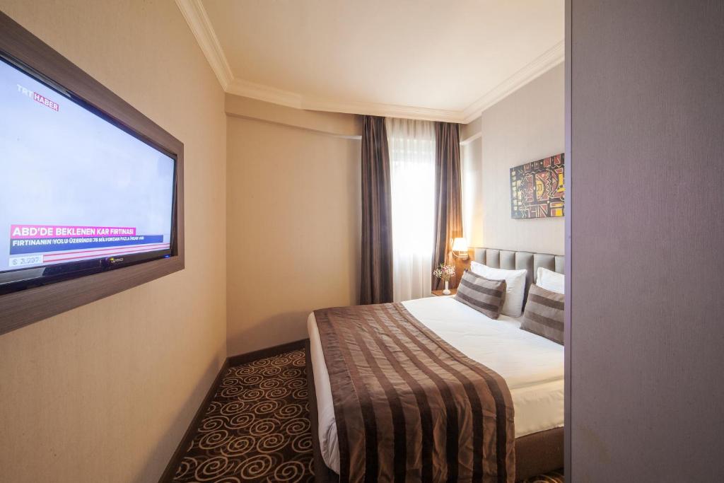 Postel nebo postele na pokoji v ubytování Delta Hotel Istanbul & Old City