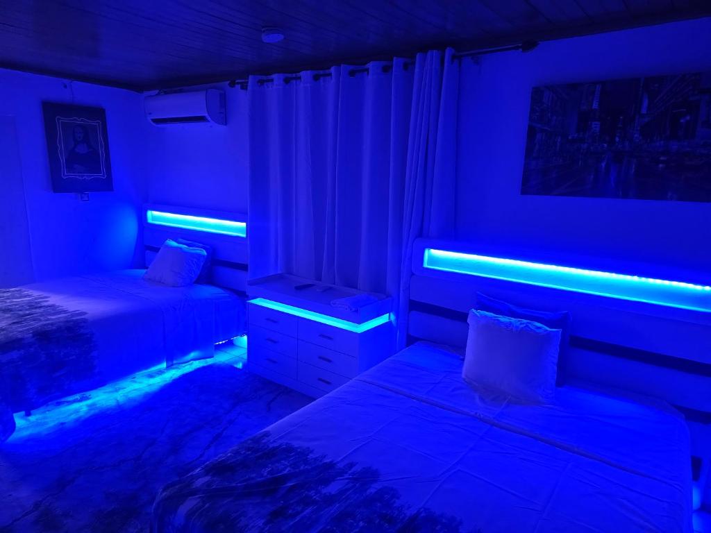 Postel nebo postele na pokoji v ubytování Big Apple Hotel