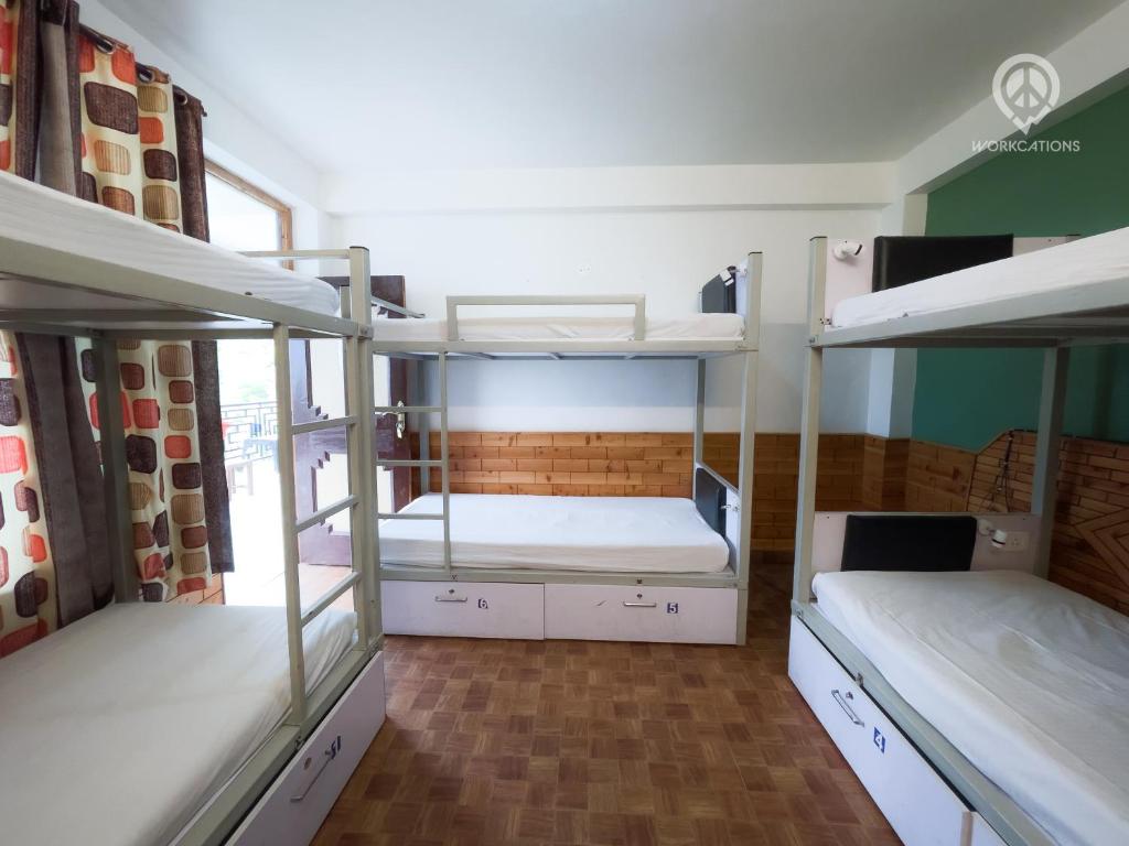 Postel nebo postele na pokoji v ubytování Dormigo