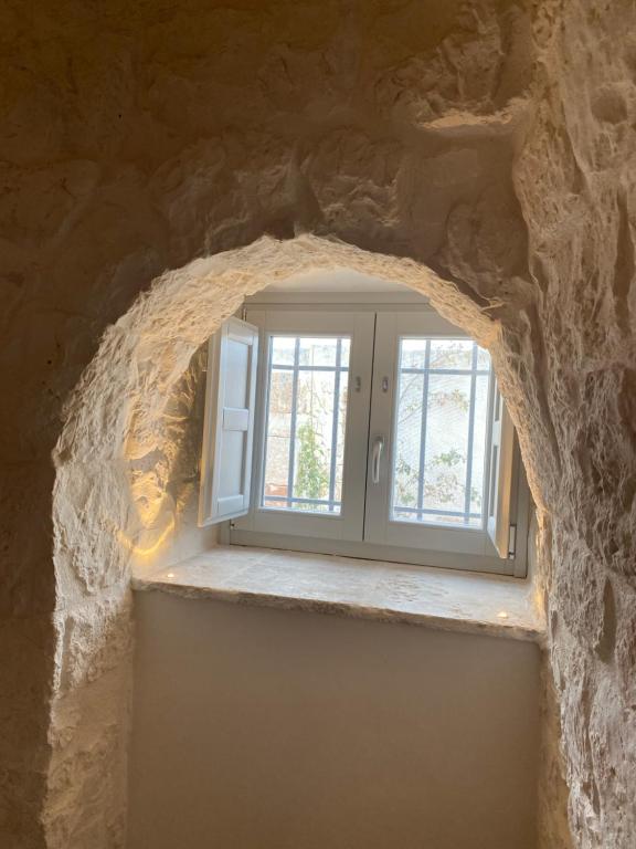 Fotografie z fotogalerie ubytování Trulli Clematis with Pool v destinaci Selva di Fasano