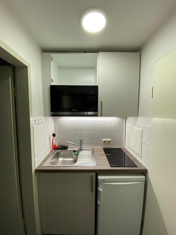 Kuchyň nebo kuchyňský kout v ubytování kleine aber feine Einzimmerwohnung in top Lage