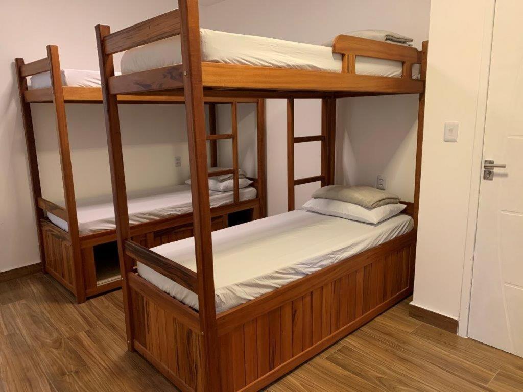 Postel nebo postele na pokoji v ubytování Lila Limao Hostel