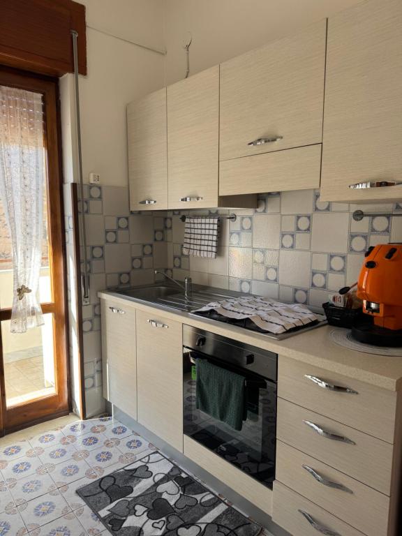 Kuchyň nebo kuchyňský kout v ubytování Casa LuAn