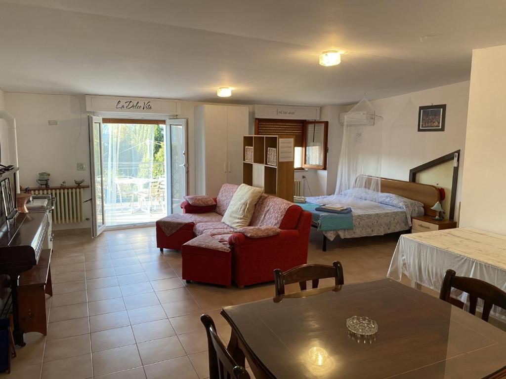 Łóżko lub łóżka w pokoju w obiekcie Casa vacanze Podere Bellavista
