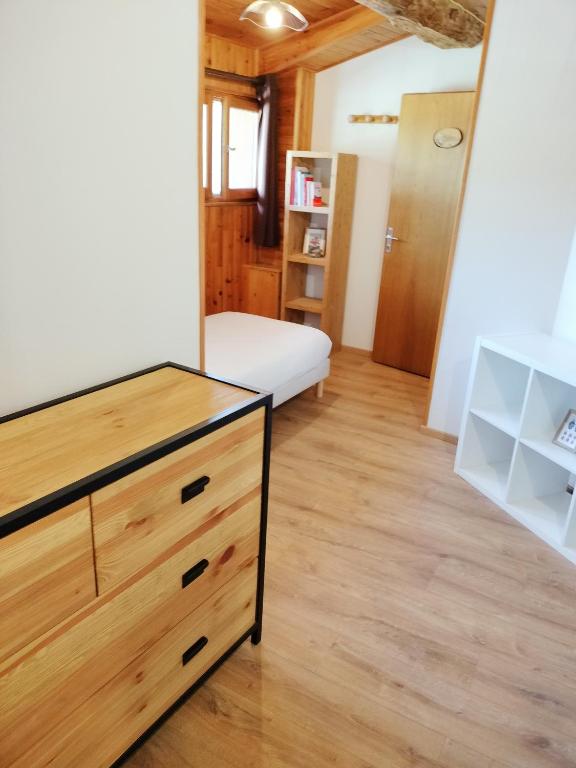Postel nebo postele na pokoji v ubytování La Roche du Croue