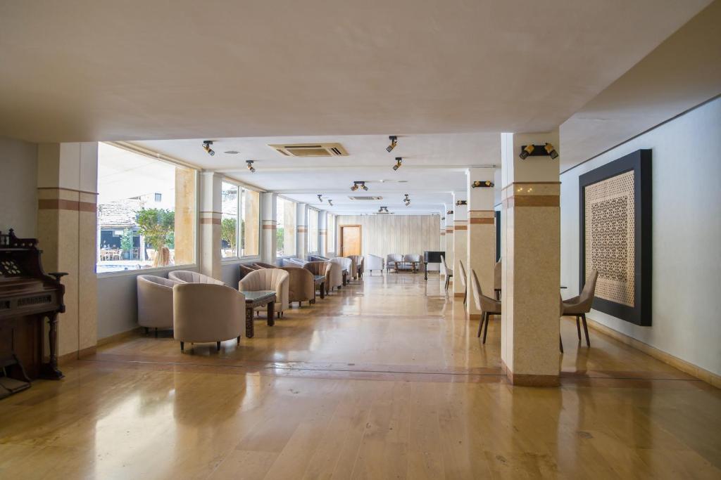 Posezení v ubytování El Oumnia Puerto & Spa