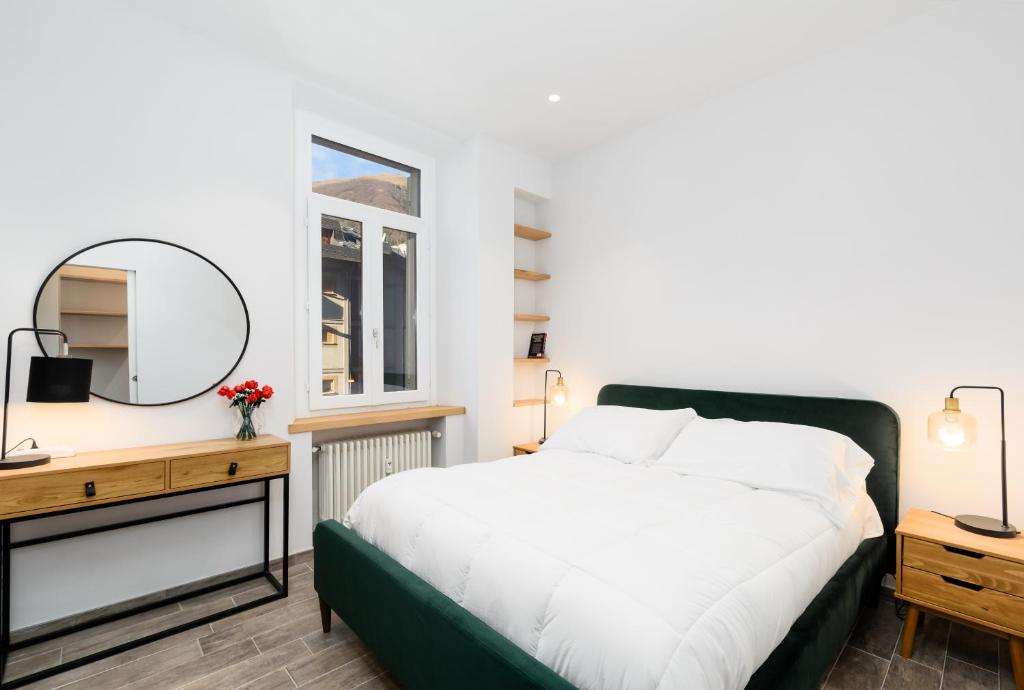Postel nebo postele na pokoji v ubytování Dolce Limone by Rentbeat