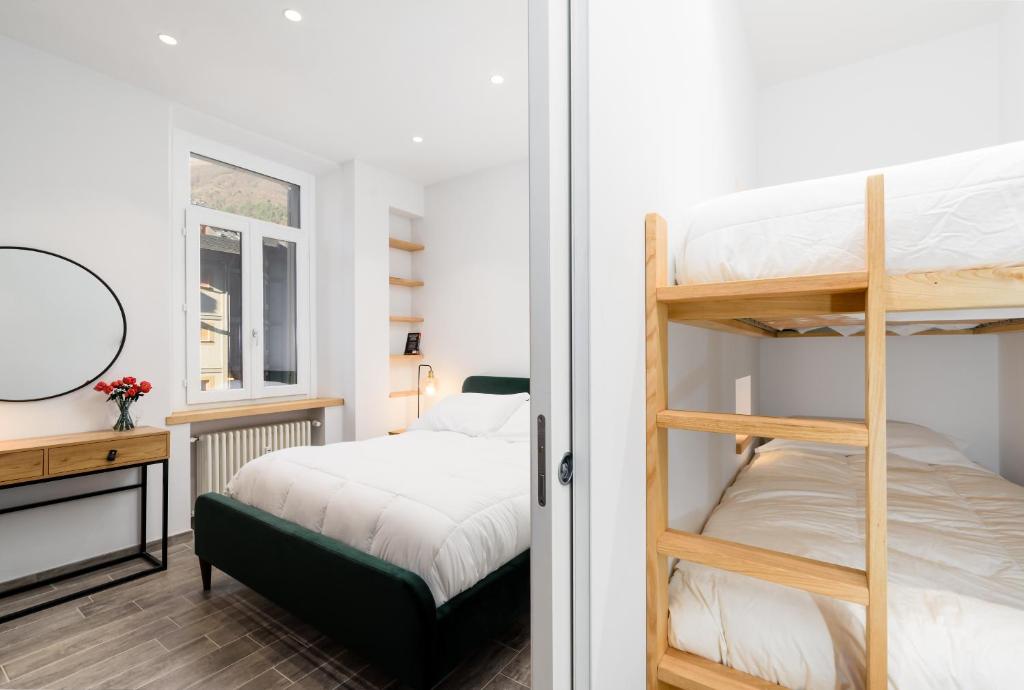 Postel nebo postele na pokoji v ubytování Dolce Limone by Rentbeat