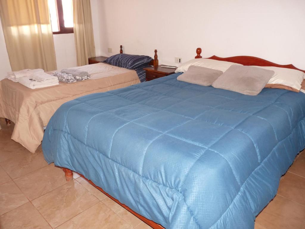 En eller flere senge i et værelse på El Valle