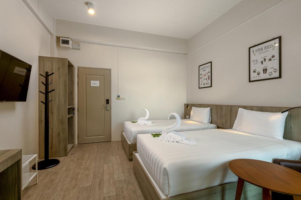 TV a/nebo společenská místnost v ubytování Ang Pao Hotel Phuket