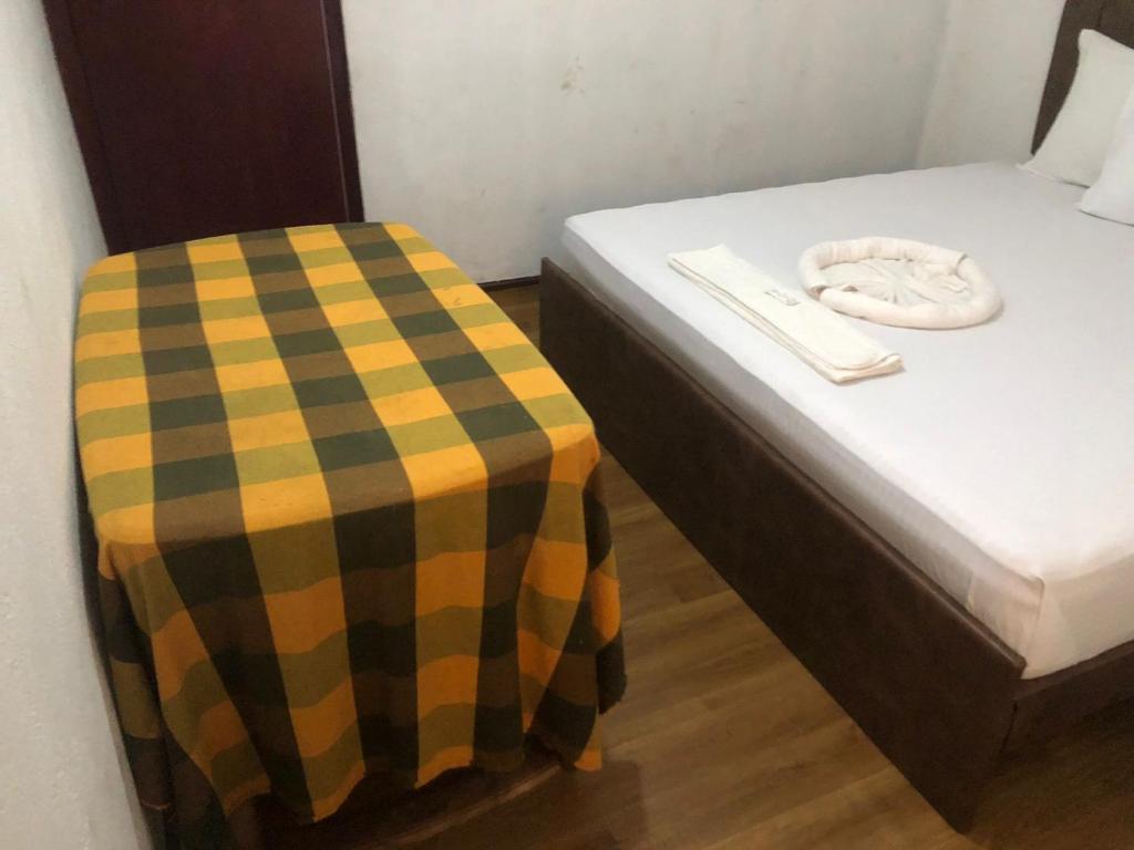Postel nebo postele na pokoji v ubytování Hotel Parami