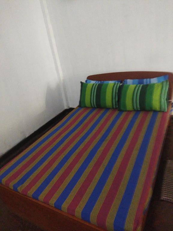 Postel nebo postele na pokoji v ubytování Hotel Parami
