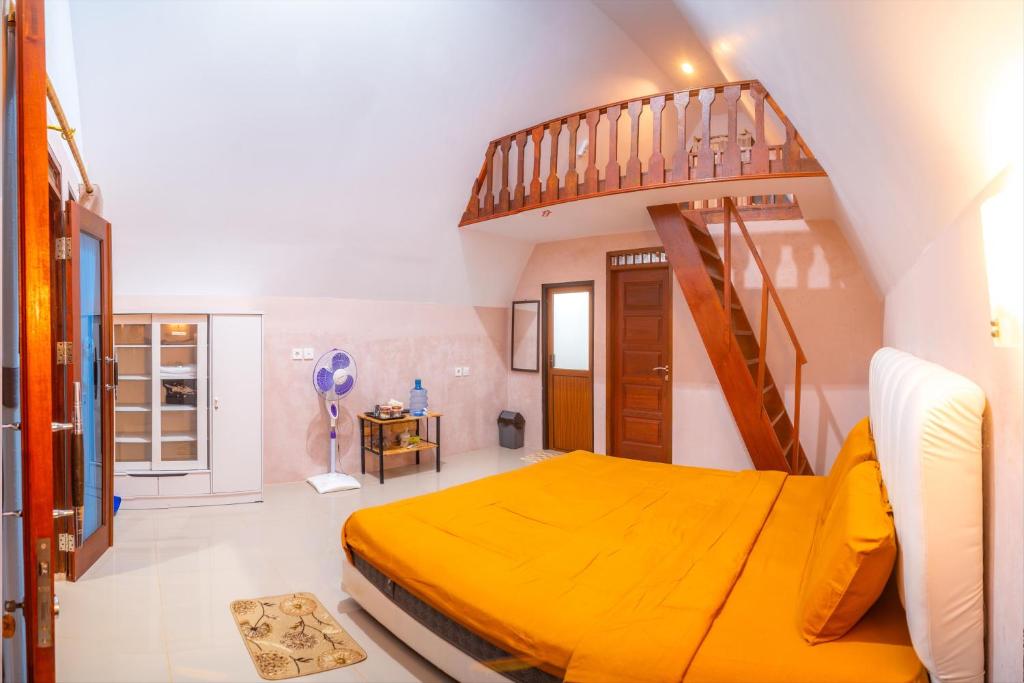 Postel nebo postele na pokoji v ubytování Livio Homestay