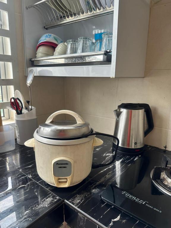 Kuchyň nebo kuchyňský kout v ubytování Ct tiara homestay