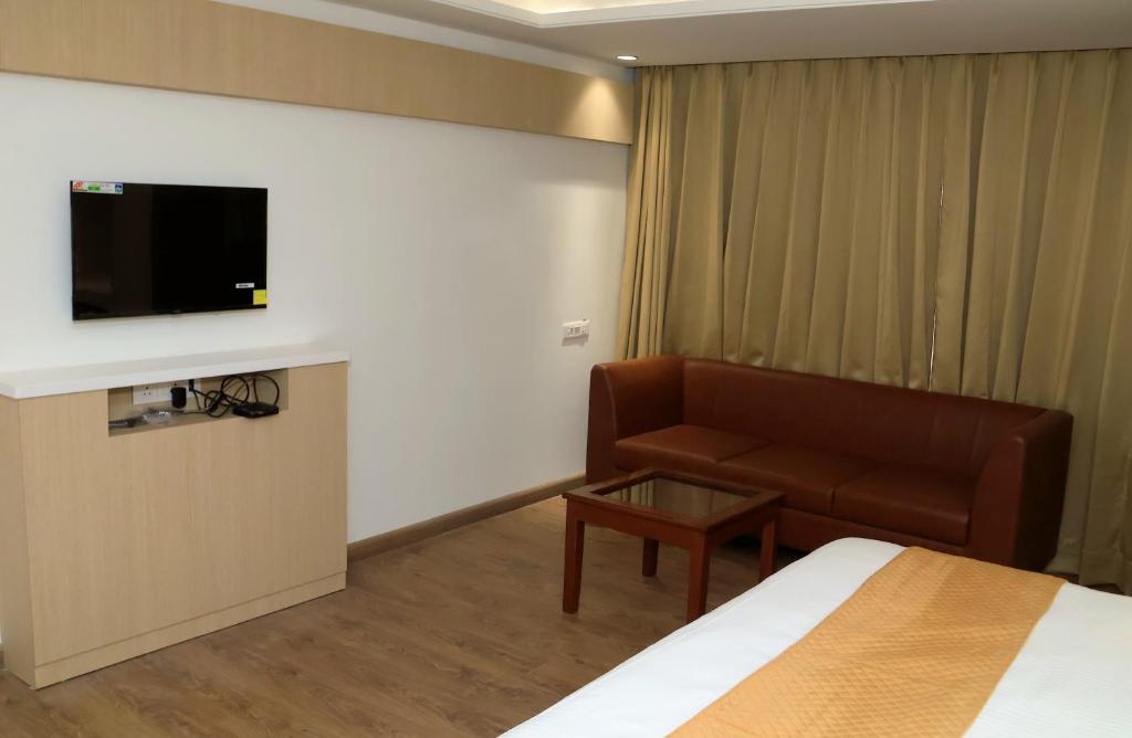 TV a/nebo společenská místnost v ubytování Hotel Radiance