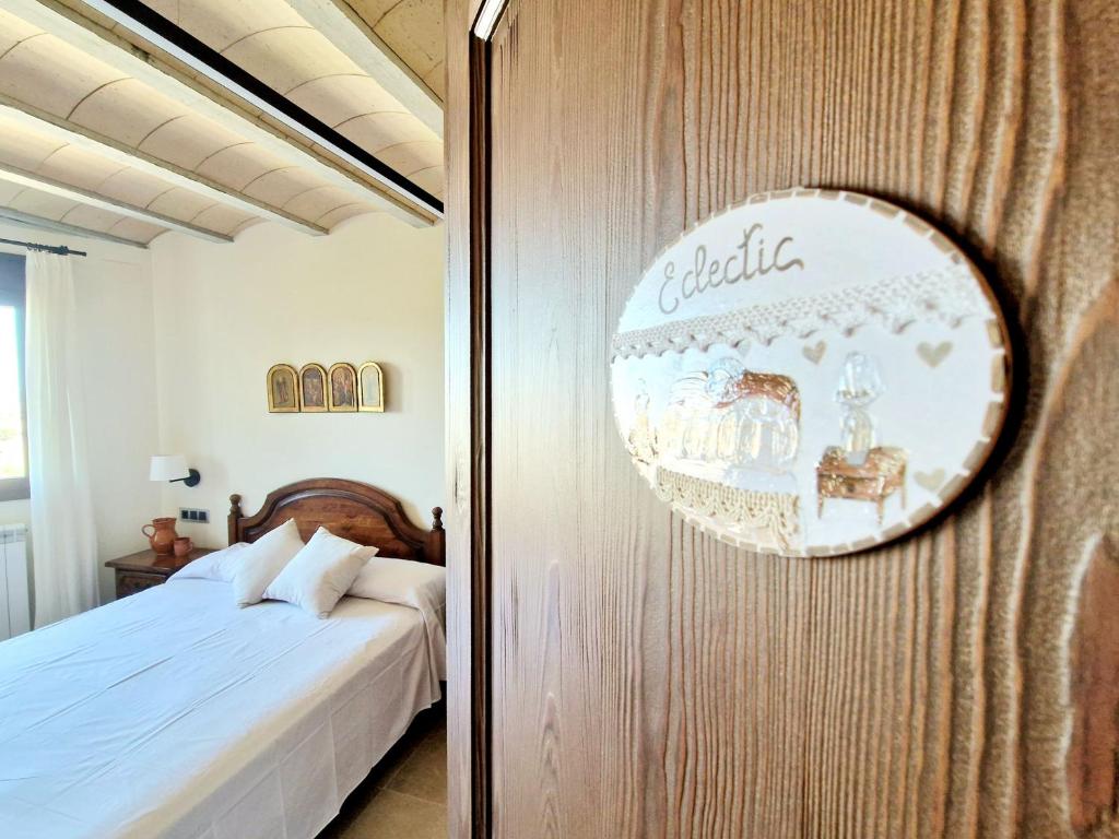 Postel nebo postele na pokoji v ubytování Casa Rural Cal Roseto con jacuzzi